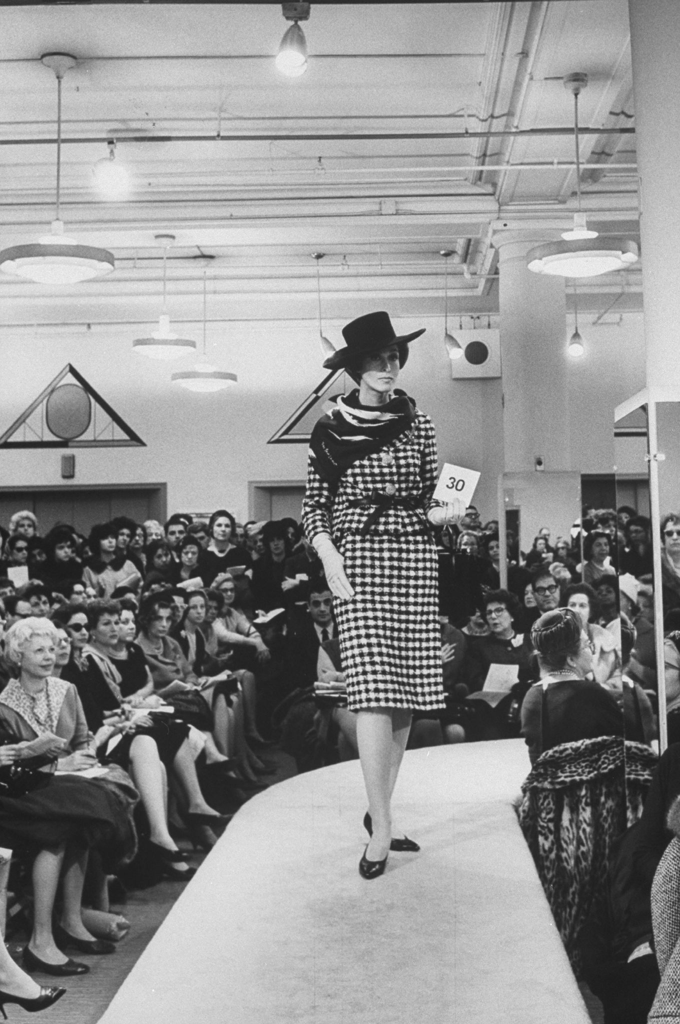 How fashion show invitations evolved through the years